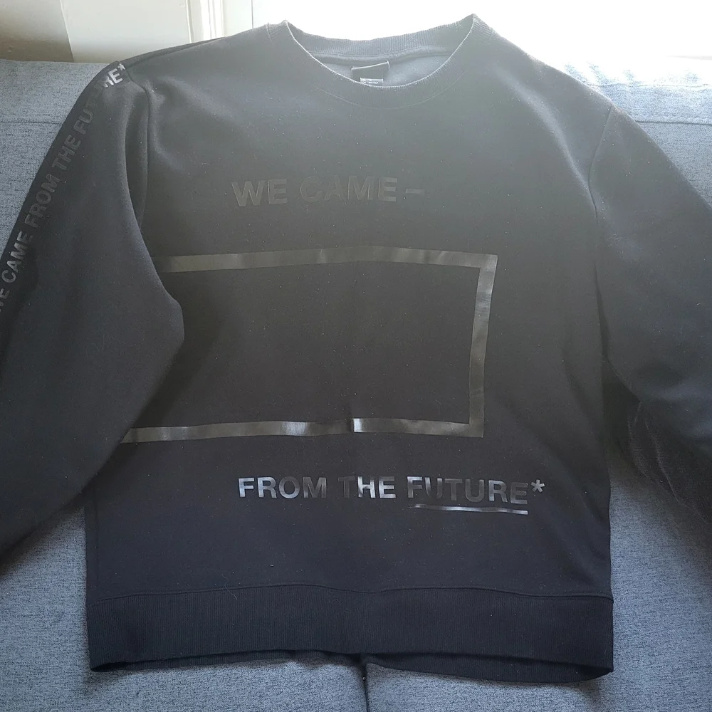 H&M Black Crewneck Sweater with Futuristic Design - Picture 1 of 2